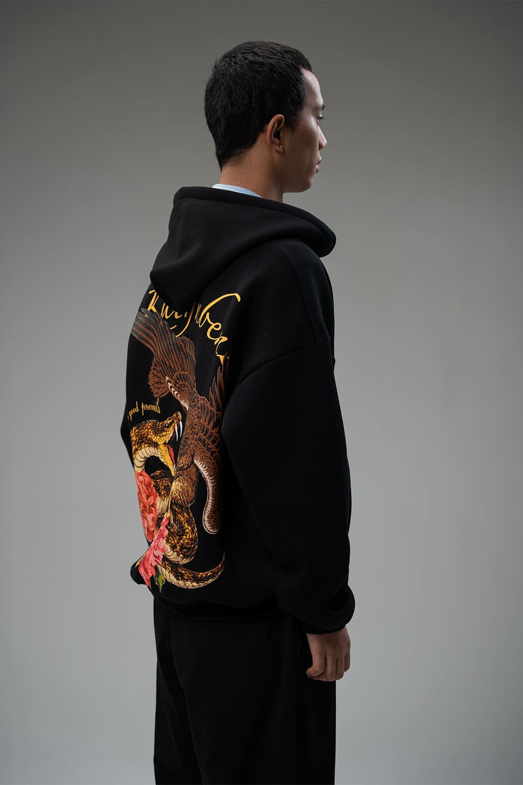 Side profile of Dominion oversized black fleece zipper jacket