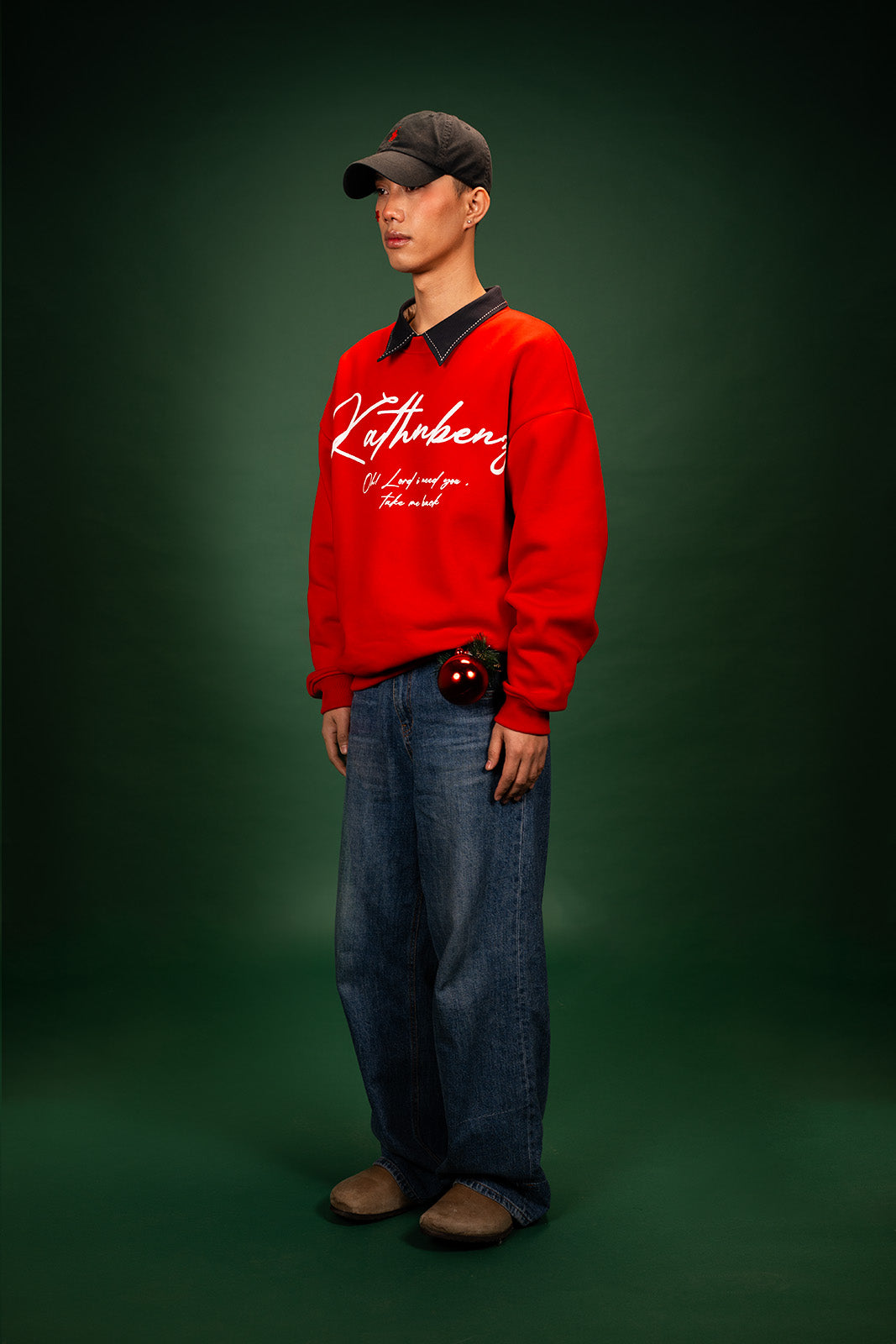 Side angle view of Crimson Deer oversized winter streetwear crewneck on model