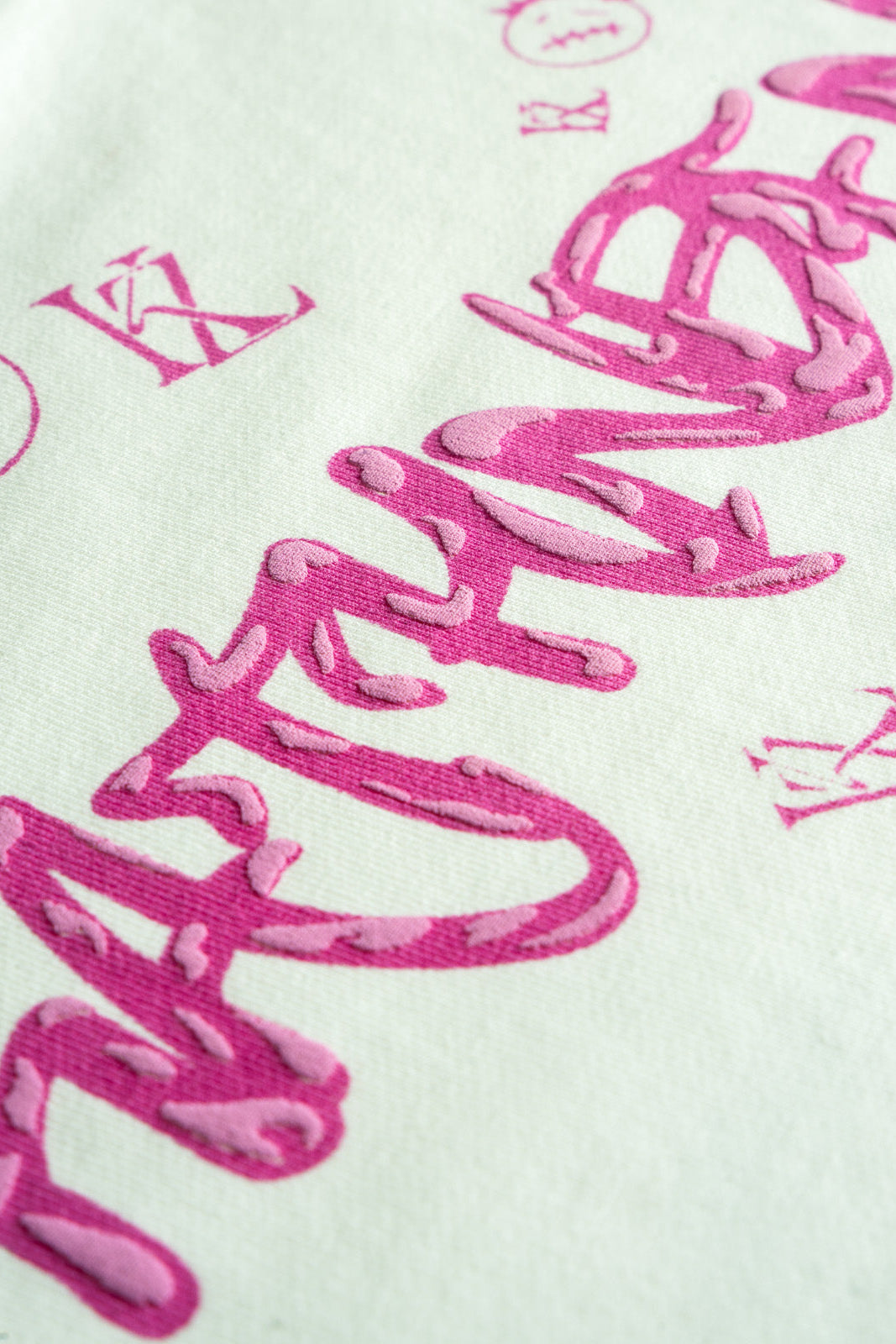 Close-up of Utopian Girl baby tee front print detail